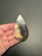 天然拉長石水滴粉紫彩光背面紋理